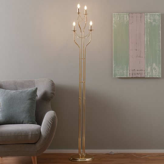 Med gyllene yta – välformad golvlampa Retro