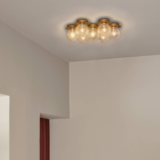 Nuura Liila Star vägglampa 7 lampor guld/klar