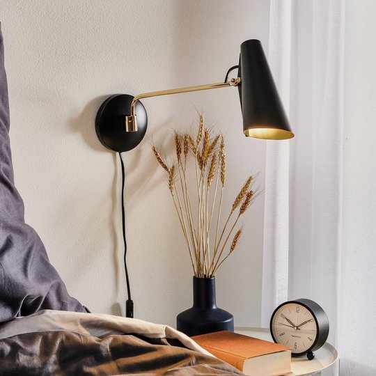 Retro-vägglampa Birdy i svart/mässing