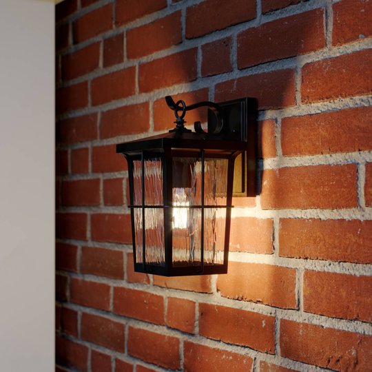 Lindby Charmaine utomhusvägglampa lykta, guldbrun