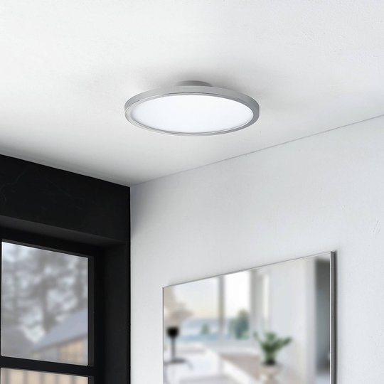 Lindby Skrolla LED-vägglampa för badrum, krom rund