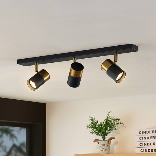 Arcchio Evaro takspotlight guldring bak 3 lampor